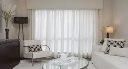 Тюль в интерьере гостиной в современном стиле