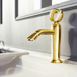 Gold Faucets In The Bathroom Interior