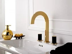 Gold Faucets In The Bathroom Interior