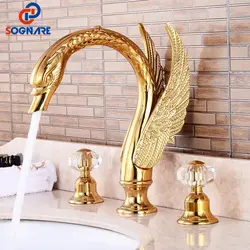 Gold faucets in the bathroom interior