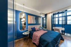 Interior with blue wardrobe in the bedroom