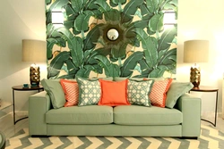 Photo wallpaper leaves in the living room interior