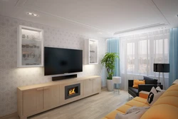 Photo of a living room with a TV and a sofa