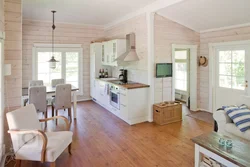 Living room kitchen interior with clapboard