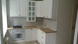 Light oak countertop in the kitchen interior