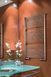 Ванна бөлмесінің фотосуретіндегі жылыту радиаторы