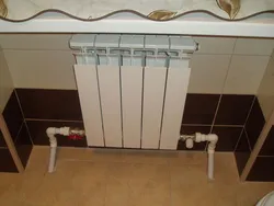Батарея отопления в ванной фото