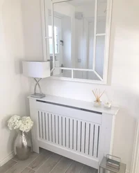Heating radiator in the bathroom photo