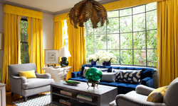 Mustard-colored curtains in the living room interior