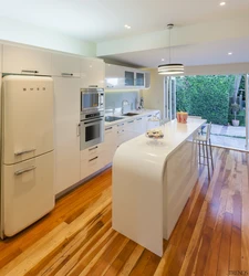 Refrigerator in the interior of the kitchen living room design photo