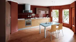 Terracotta color kitchen photo in the interior