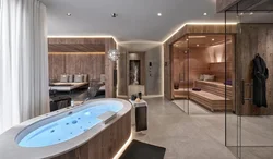 Кіріктірілген ваннасы бар ванна бөлмесінің интерьері