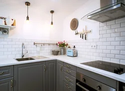 Kitchen apron made of white hog tiles photo