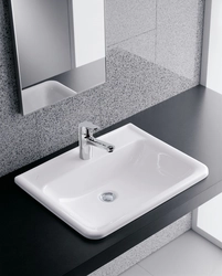 Countertop mounted bath sink photo