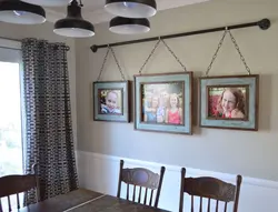 Wall with photographs in the kitchen