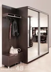 Wardrobe in the hallway with shoe rack and hanger photo