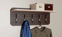 Shelf for hats in the hallway photo