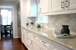 Combination of countertop and apron in the kitchen photo in the interior