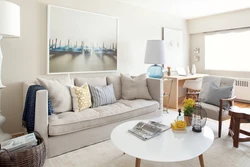 Gray sofa in a beige living room photo