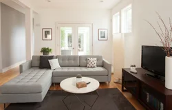 Серый диван в бежевой гостиной фото