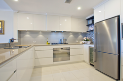 Modern Corner Kitchen Design In Light Colors Photo