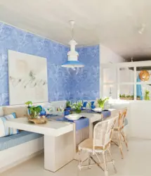 Blue color of the walls in the kitchen in the interior