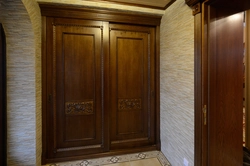 Wooden cabinets in the hallway photo