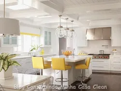 Kitchen with yellow chairs photo