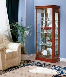 Cabinet in the living room for dishes with glass in a modern style photo