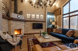 Fireplace in the interior of the living room of a country house photo