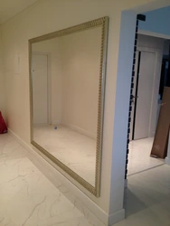 Large mirror in the hallway on the entire wall photo