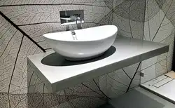 Bathroom sink overlay on the countertop photo of the bathtub