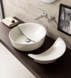 Bathroom sink overlay on the countertop photo of the bathtub