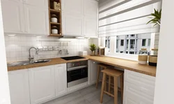 White kitchen black appliances photo wooden countertop