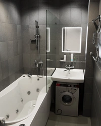 Bath design sink above washing machine