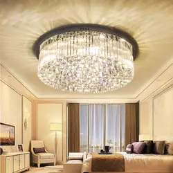 Modern chandelier under a suspended ceiling in the bedroom photo