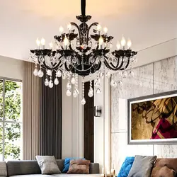 Low chandelier in the living room interior