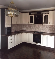 Kitchen design with a dark apron and dark countertop photo