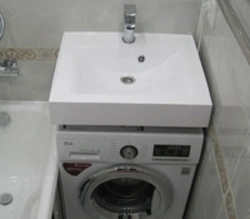 Bathroom Design With A Sink Above The Washing Machine Photo