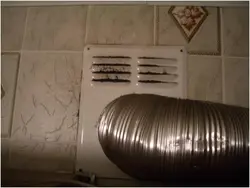 How to properly install a grate on the hood in the kitchen photo