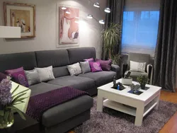 Дизайн гостиной с диваном в серых тонах