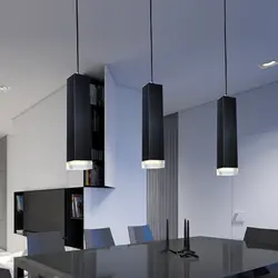 Pendant Lamps Above The Bar Counter In The Kitchen In The Interior