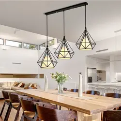 Pendant Lamps Above The Bar Counter In The Kitchen In The Interior