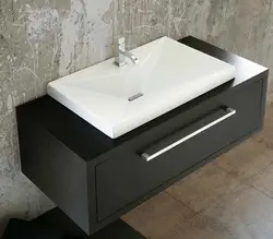 Bath cabinet with countertop sink photo