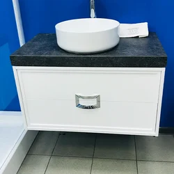 Bath cabinet with countertop sink photo