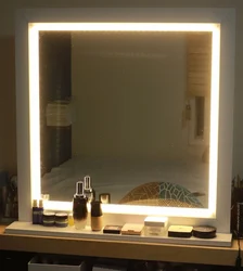 Illuminated mirror in the bedroom interior