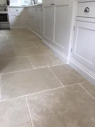 Light floor tiles for kitchen design