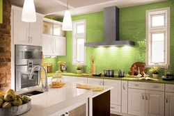 Kitchen with green tile splashback design