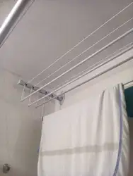 Drying Clothes In Bathroom Photo