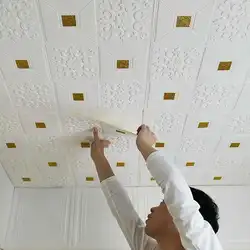 Ceiling tiles in the bathtub on the walls photo